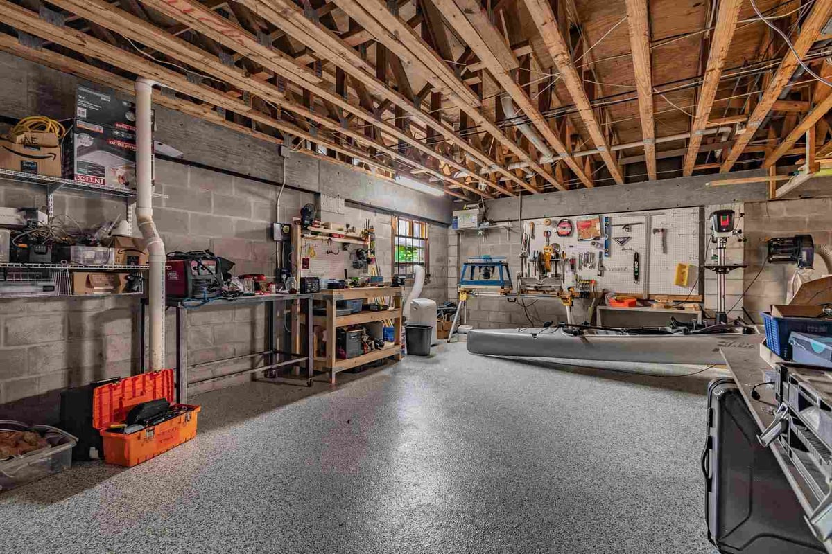 before waterfront renovation bradenton garage workshop epoxy floor