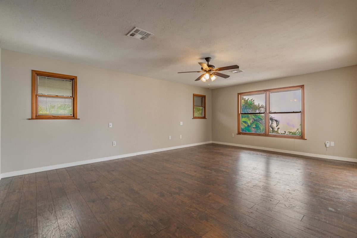 before waterfront renovation bradenton living room hardwood pool view