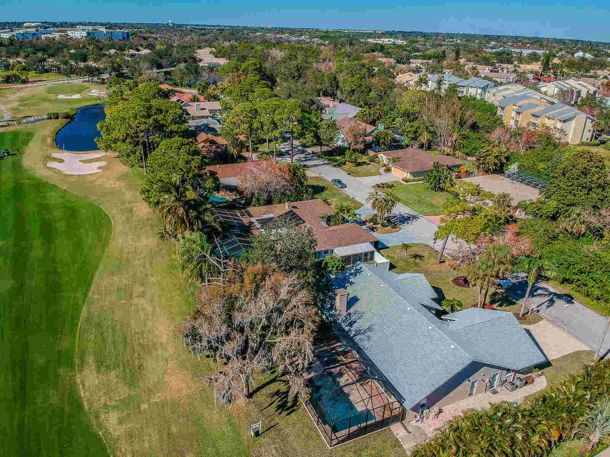 avenida madera aerial view of house golf course and pond
