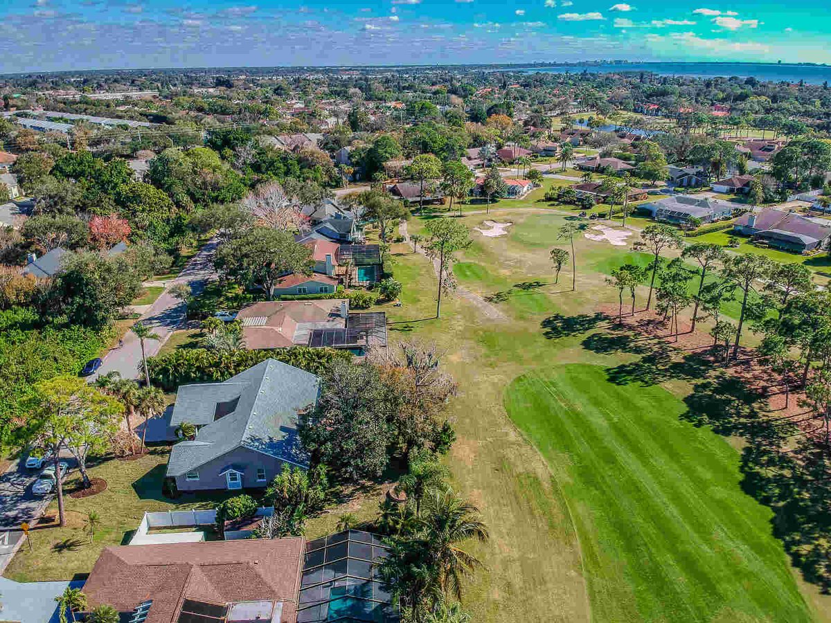 avenida madera aerial view of neighborhood golf course and bay