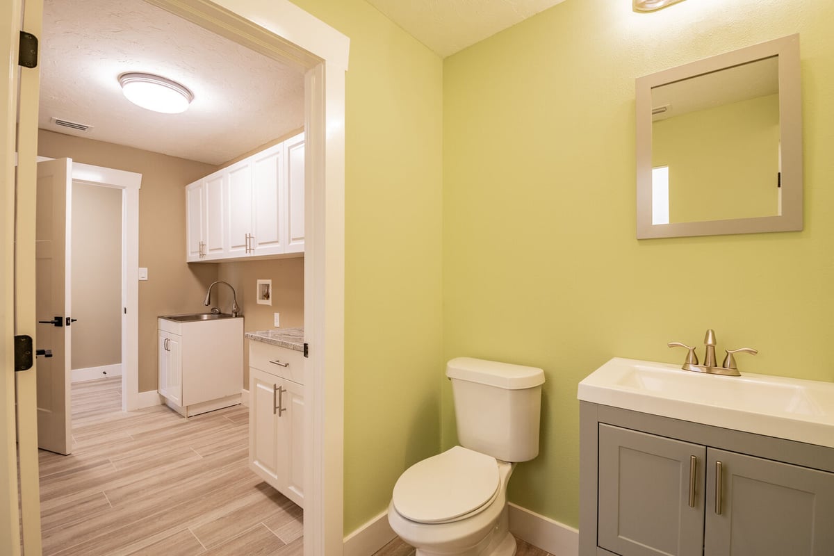 avenida madera bathroom with toilet and laundry room view