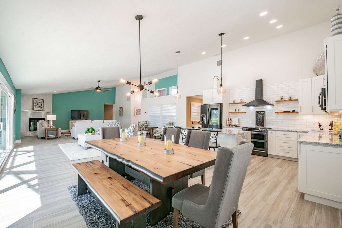 avenida madera dining table with bench and open kitchen
