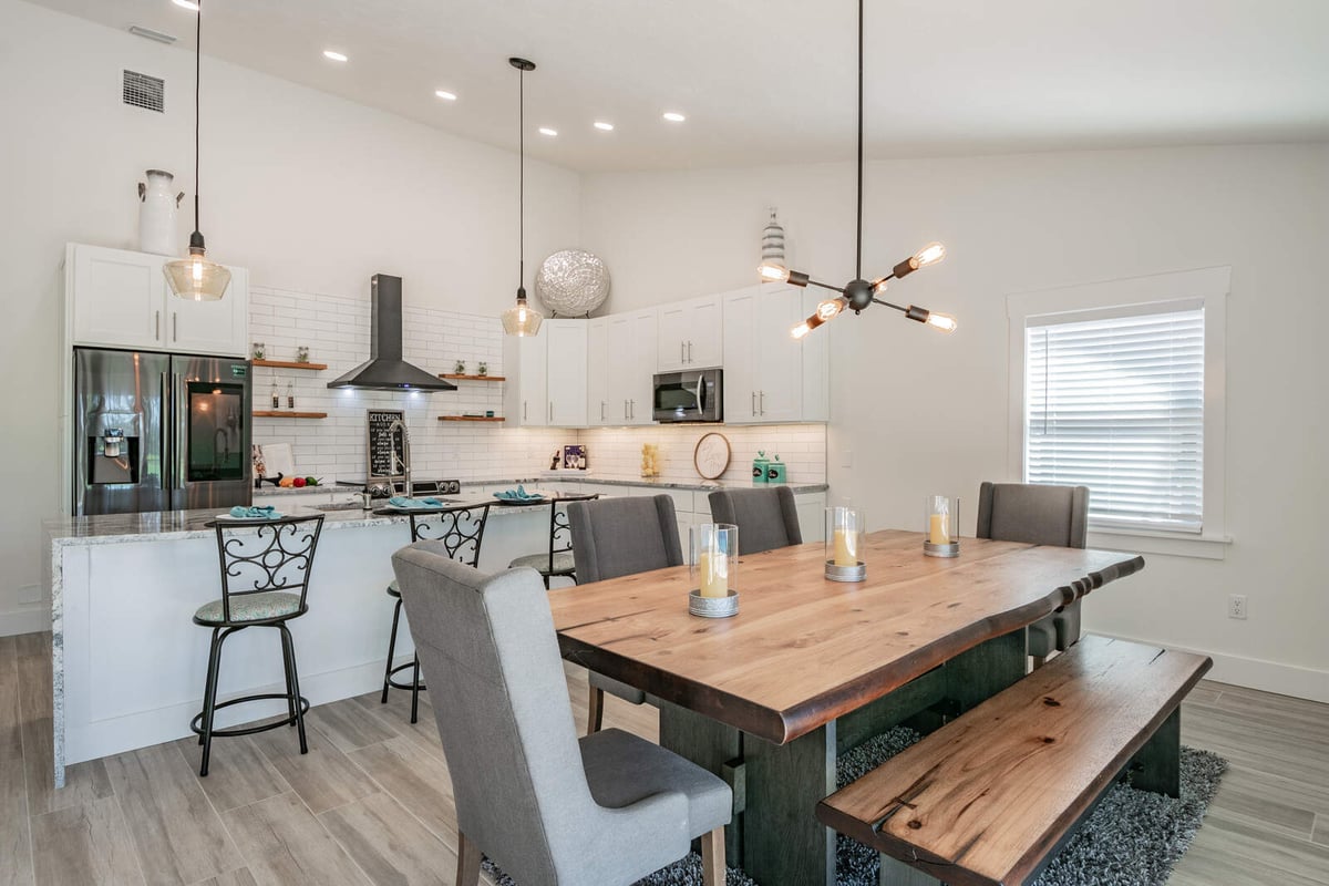 avenida madera dining table with bench and pendant lights