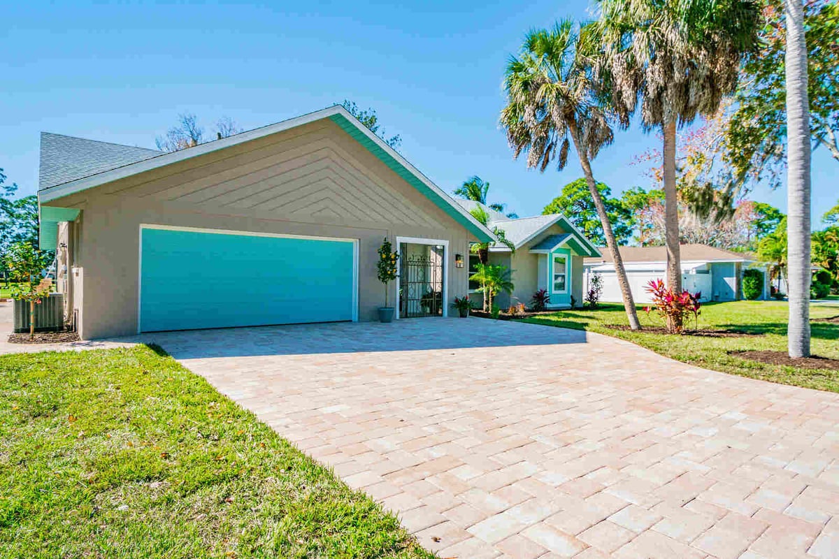 avenida madera exterior teal garage door and driveway