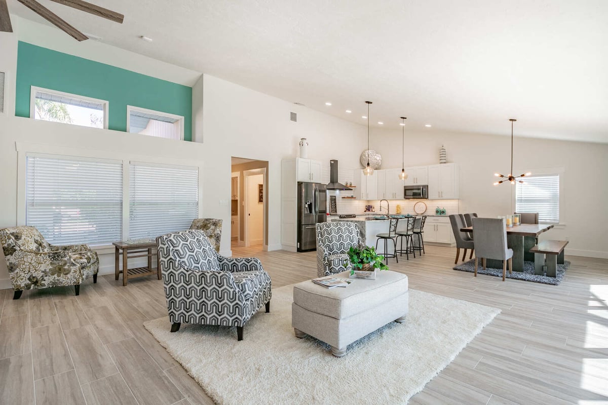 avenida madera living room with accent chairs and dining area