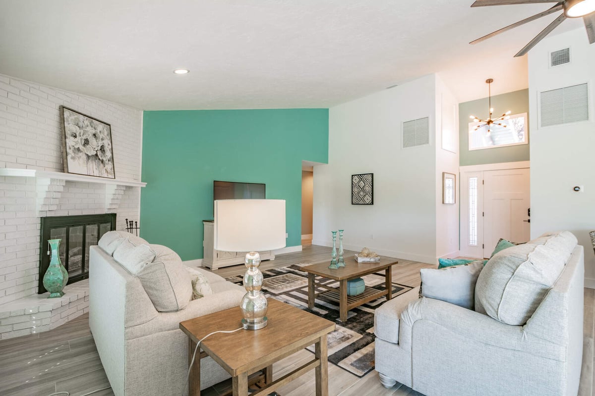 avenida madera living room with fireplace and front entry