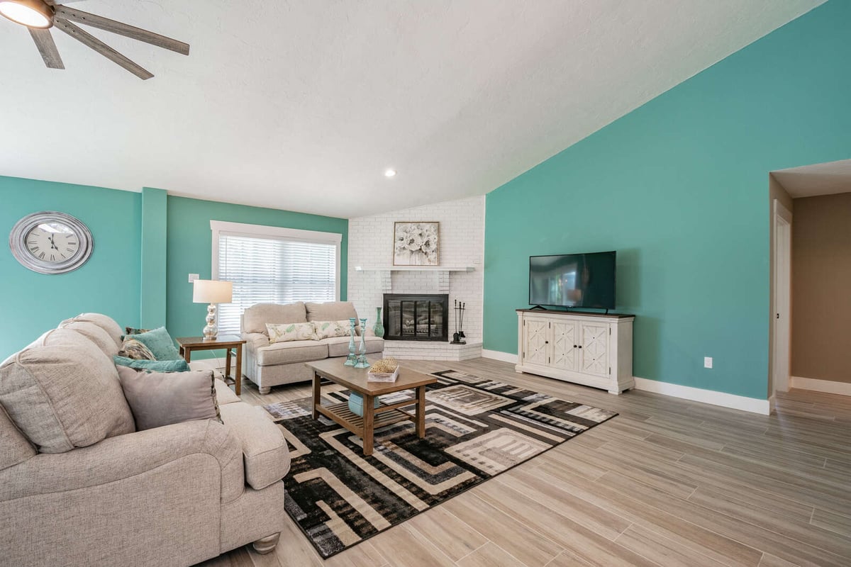 avenida madera living room with fireplace and tv console