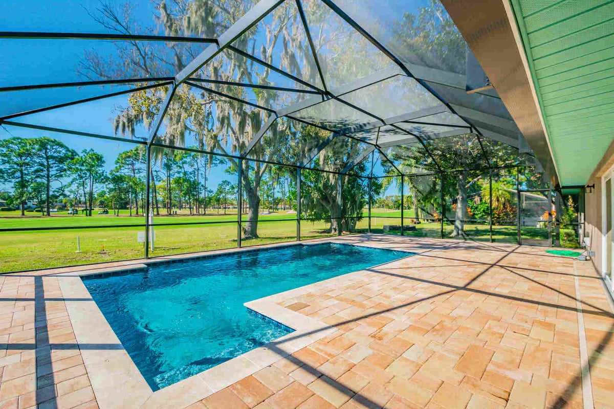 avenida madera screened pool with golf course view
