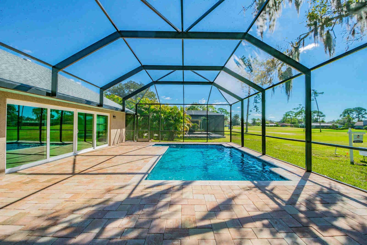 avenida madera screened pool with sliding glass doors