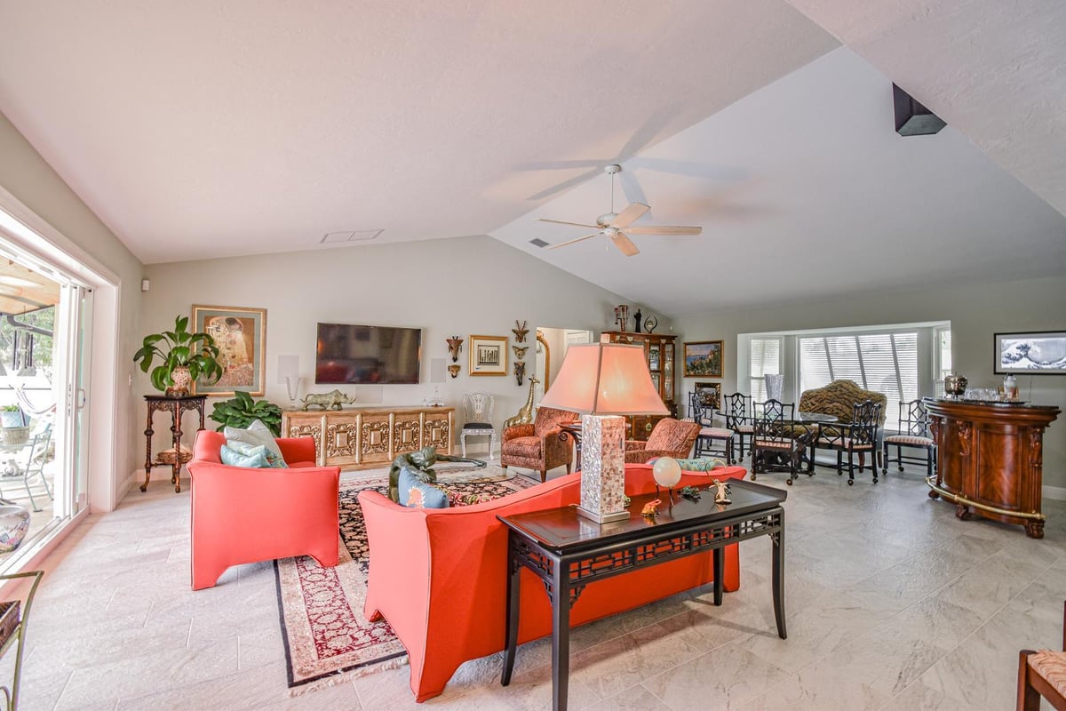 45th st west bradenton living room orange sofas giraffe decor