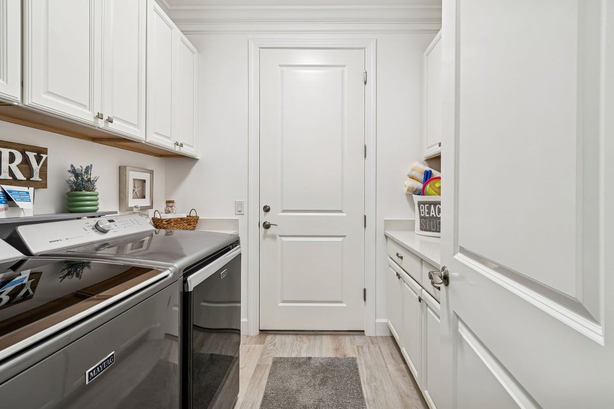 chester trail lakewood ranch laundry room white cabinets