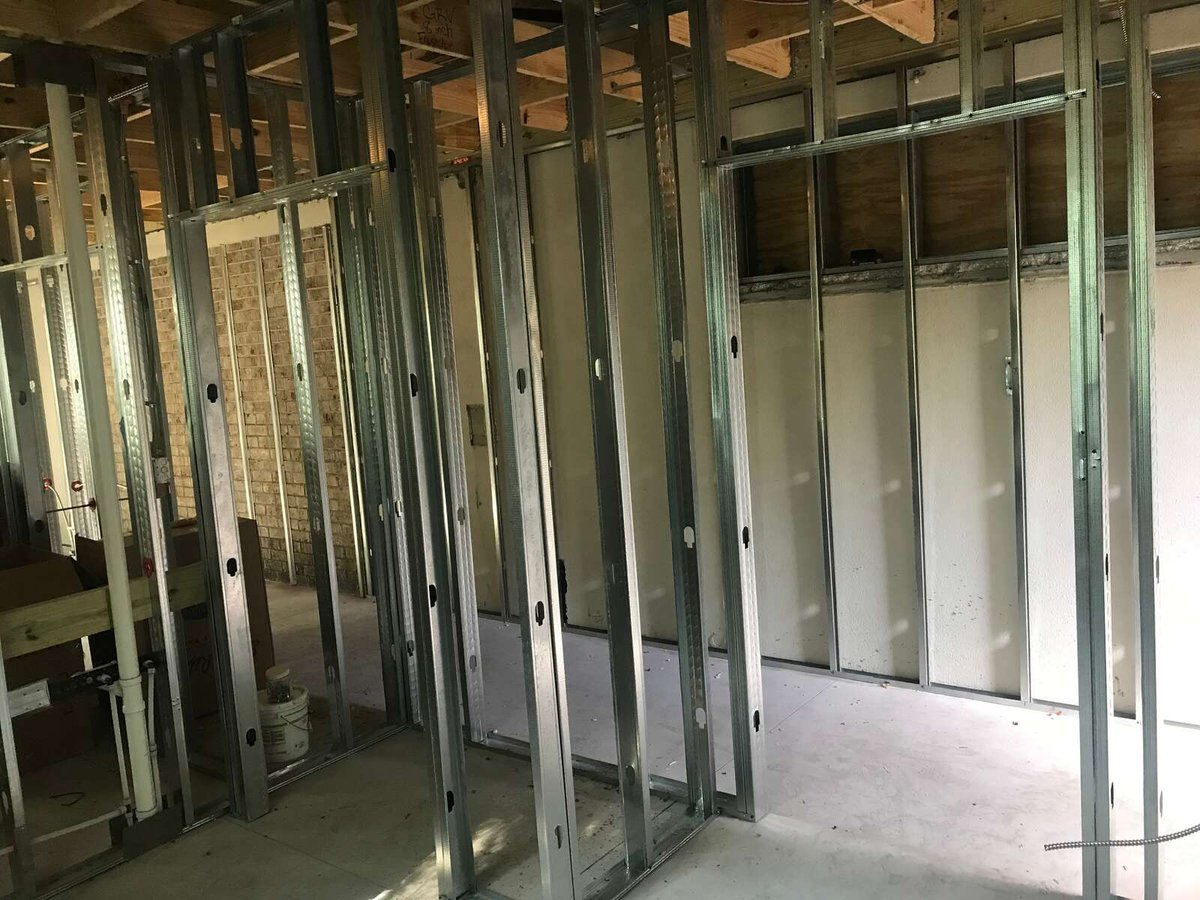 bradenton research center interior metal stud framing brick wall