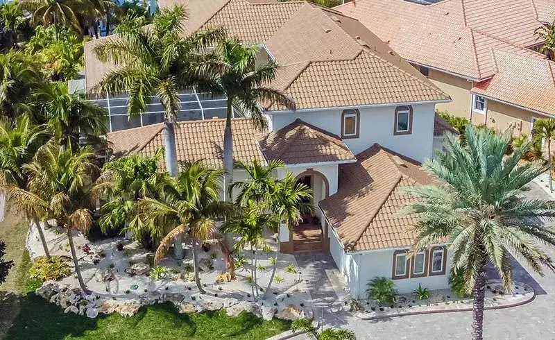 the fishcamp aerial exterior tile roof palm trees
