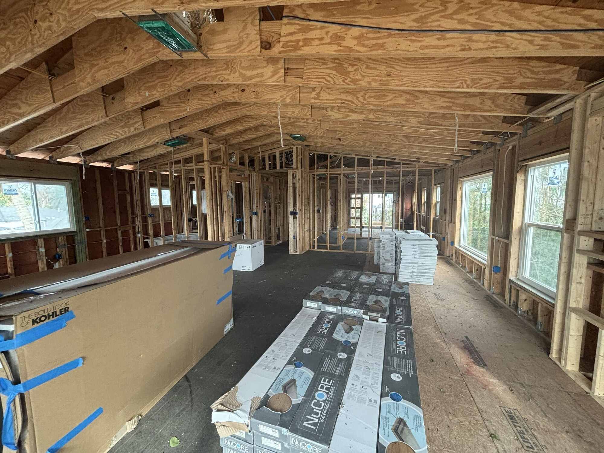 Interior framing progress of custom home construction by Adkins Building & Construction in Longboat Key, FL.
