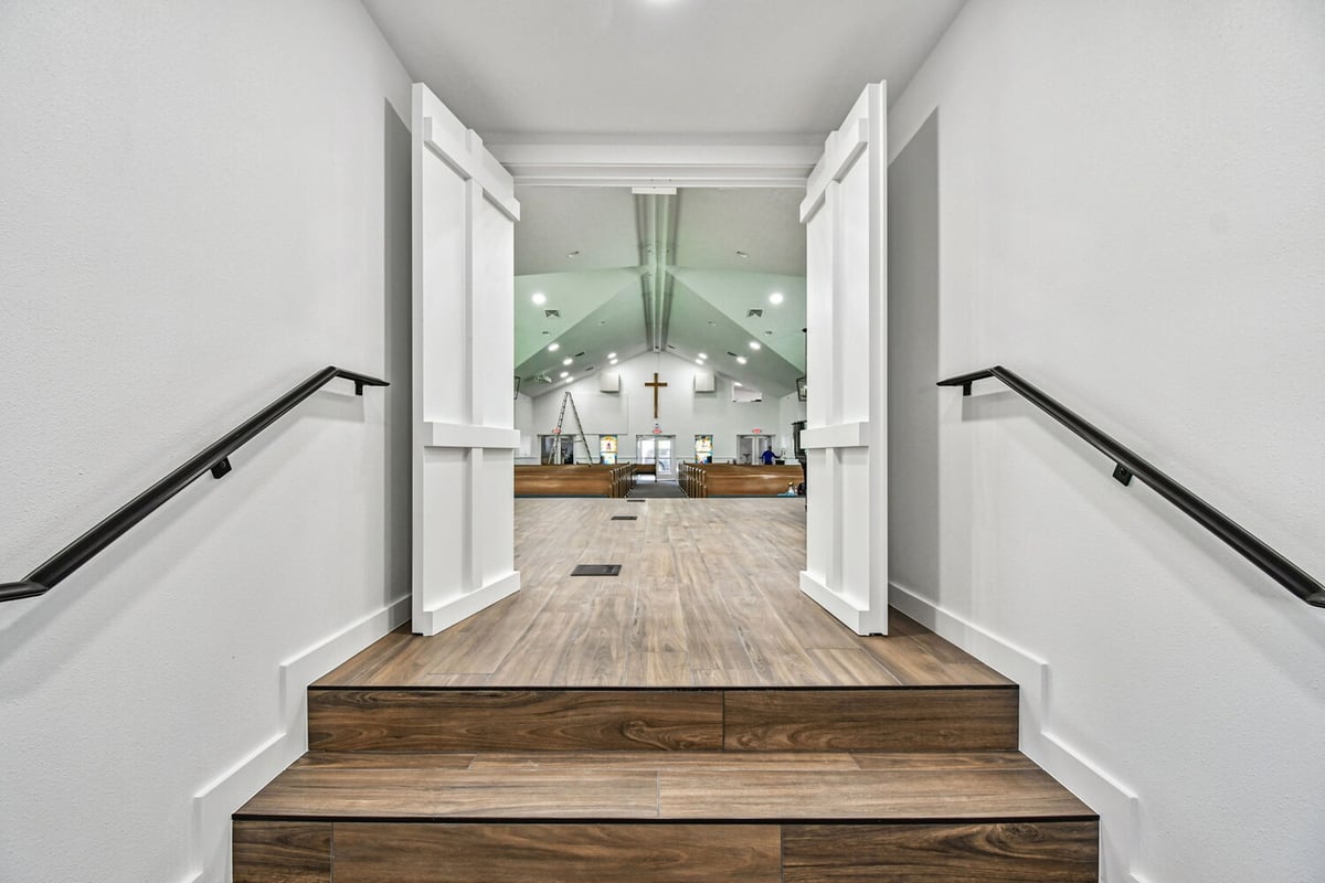 View from stage steps looking into remodeled sanctuary by Adkins Building & Construction in Anna Maria, FL