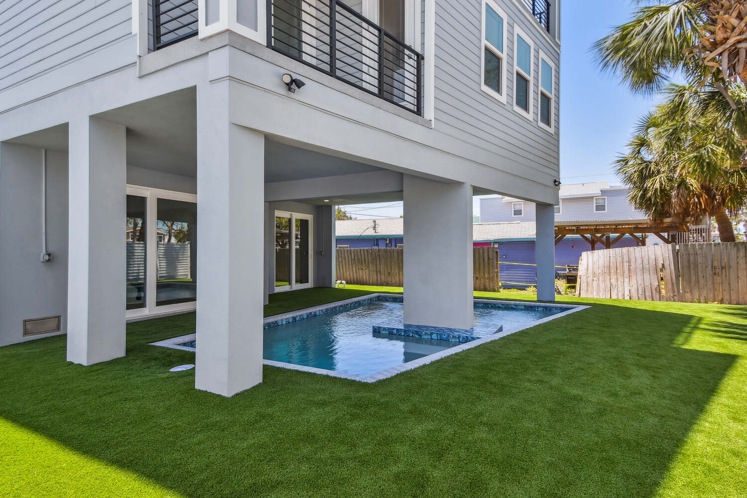 Custom backyard pool installation in Bradenton, FL by Adkins Building & Construction