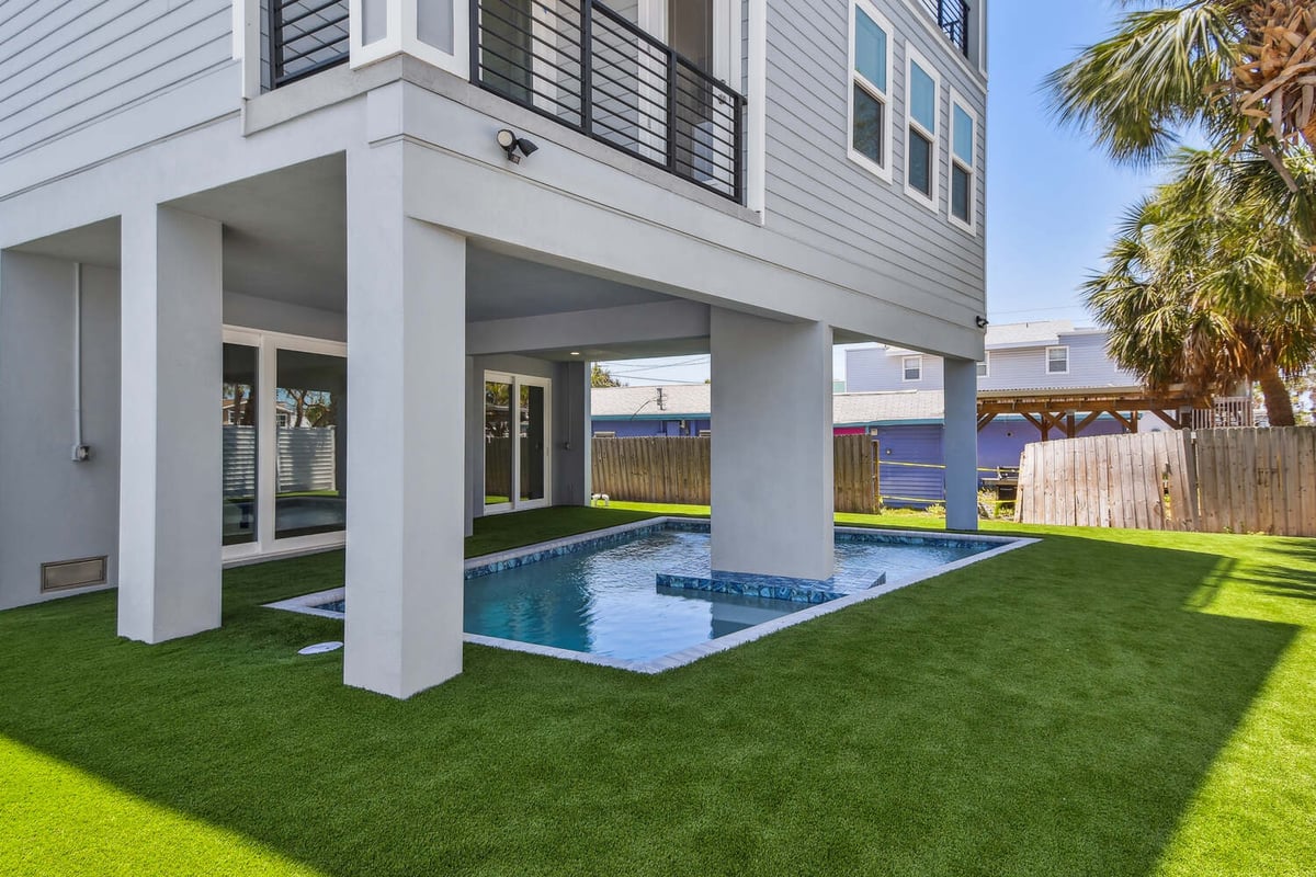 Custom backyard pool installation in Bradenton, FL by Adkins Building & Construction