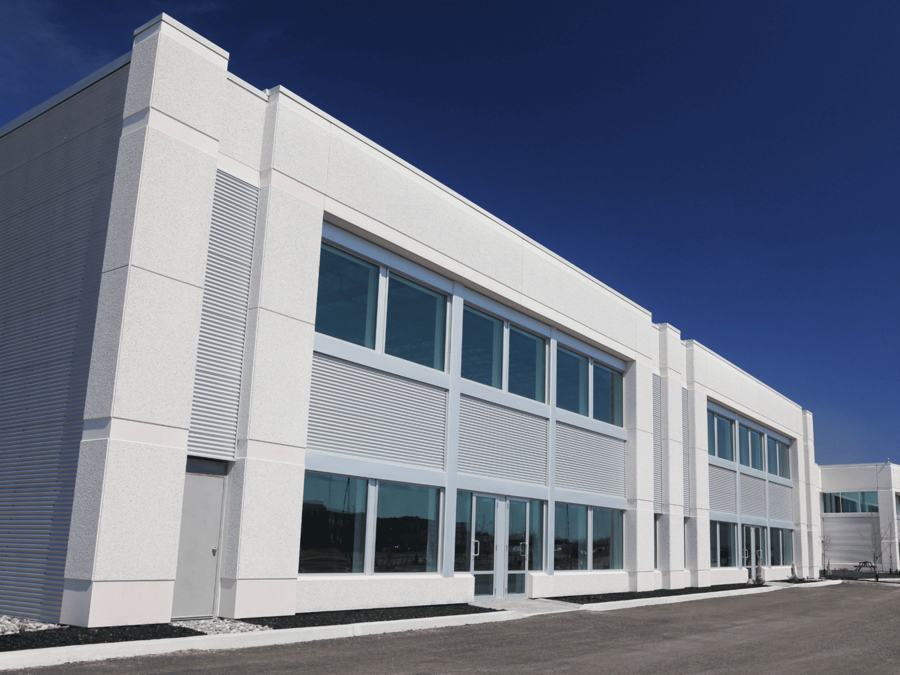 ABC Stock White Exterior of Commercial Building