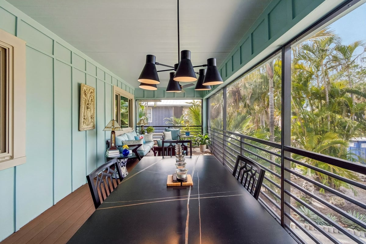 Exterior Screened Porch Dining Table Black Pendant Light Teal Walls