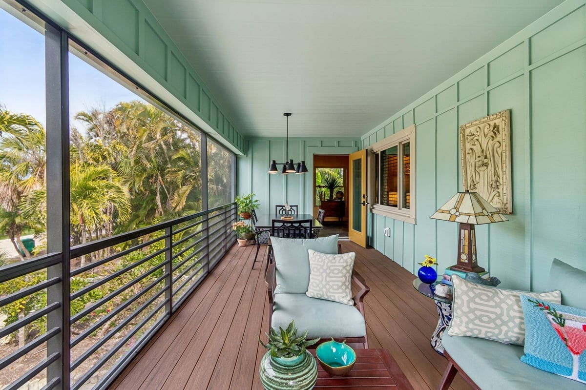 Exterior Screened Porch Lounge Seating Teal Walls Wood Deck