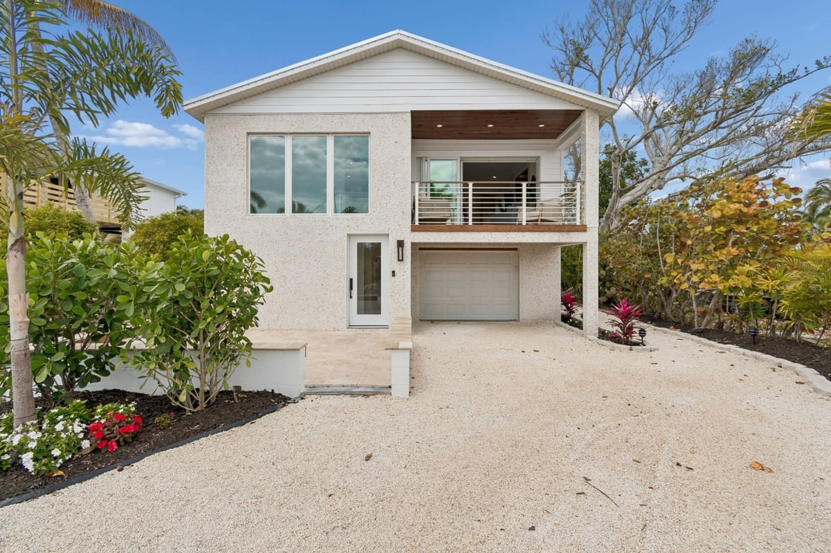 Coastal Home Exterior Front Entrance White Stucco
