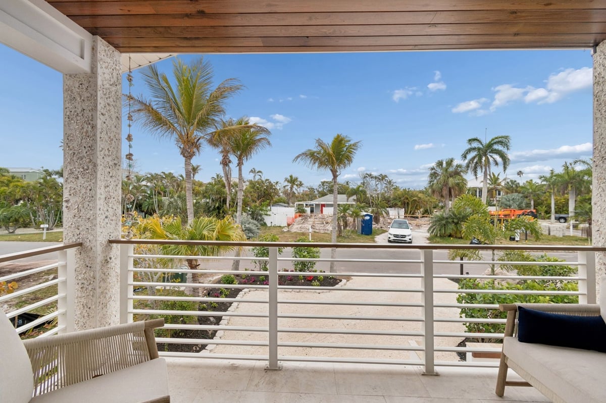 Exterior Upper Balcony Wood Ceiling Cable Railing Tropical Neighborhood View