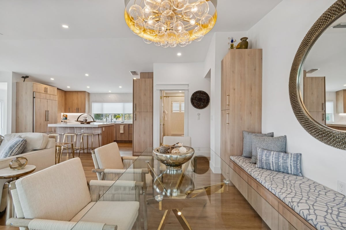 Interior Dining Room View Toward Kitchen Bubble Chandelier Window Seat