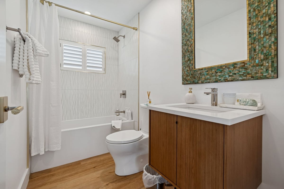 Interior Guest Bathroom Tub Shower Mosaic Mirror Frame Wood Vanity