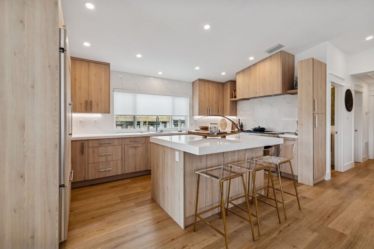 Interior Kitchen Full View Island Wood Cabinetry Marble Backsplash