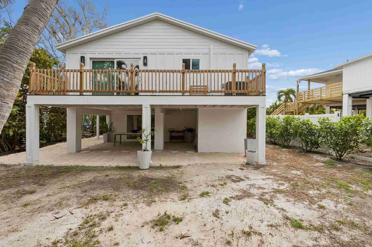 longboat key new home rear exterior elevated stilts wood deck